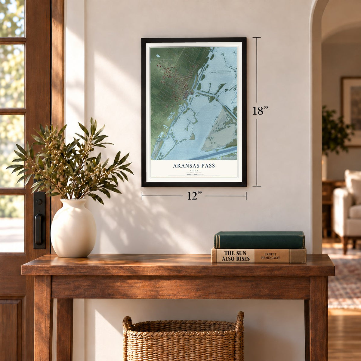 Aransas Pass, Texas map, 12 x 18 inch print in a black frame in an entryway