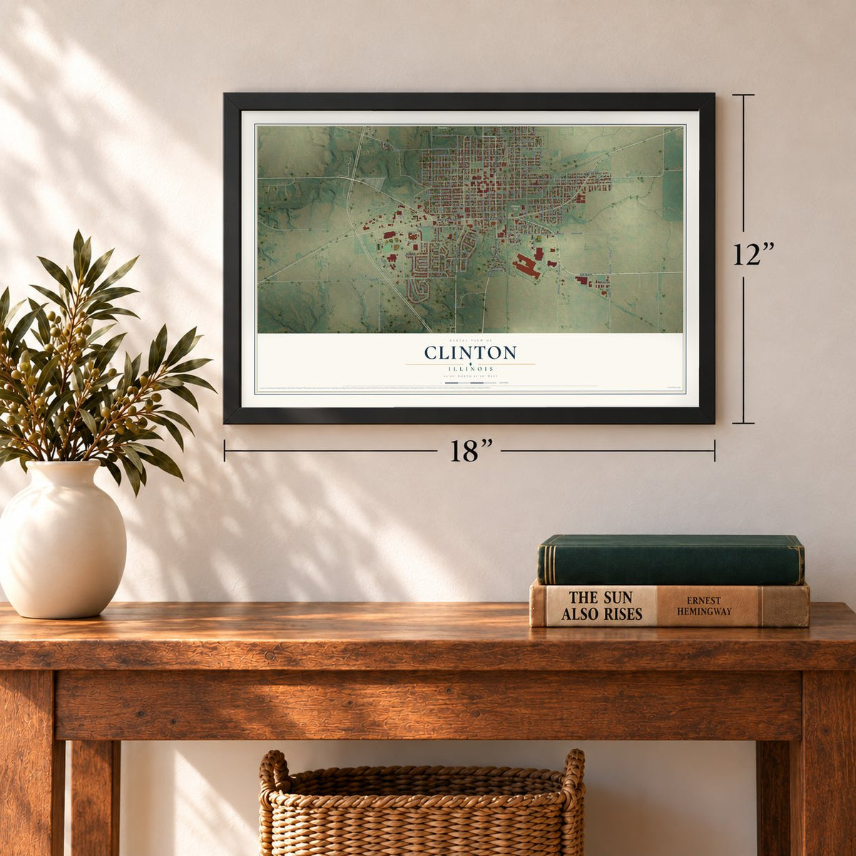Clinton, Illinois map, 12 x 18 inch print in a black frame in an entryway