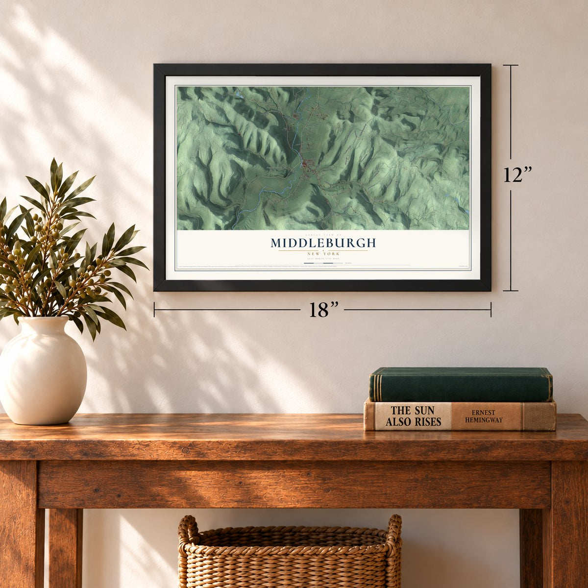 Middleburgh, New York map, 12 x 18 inch print in a black frame in an entryway