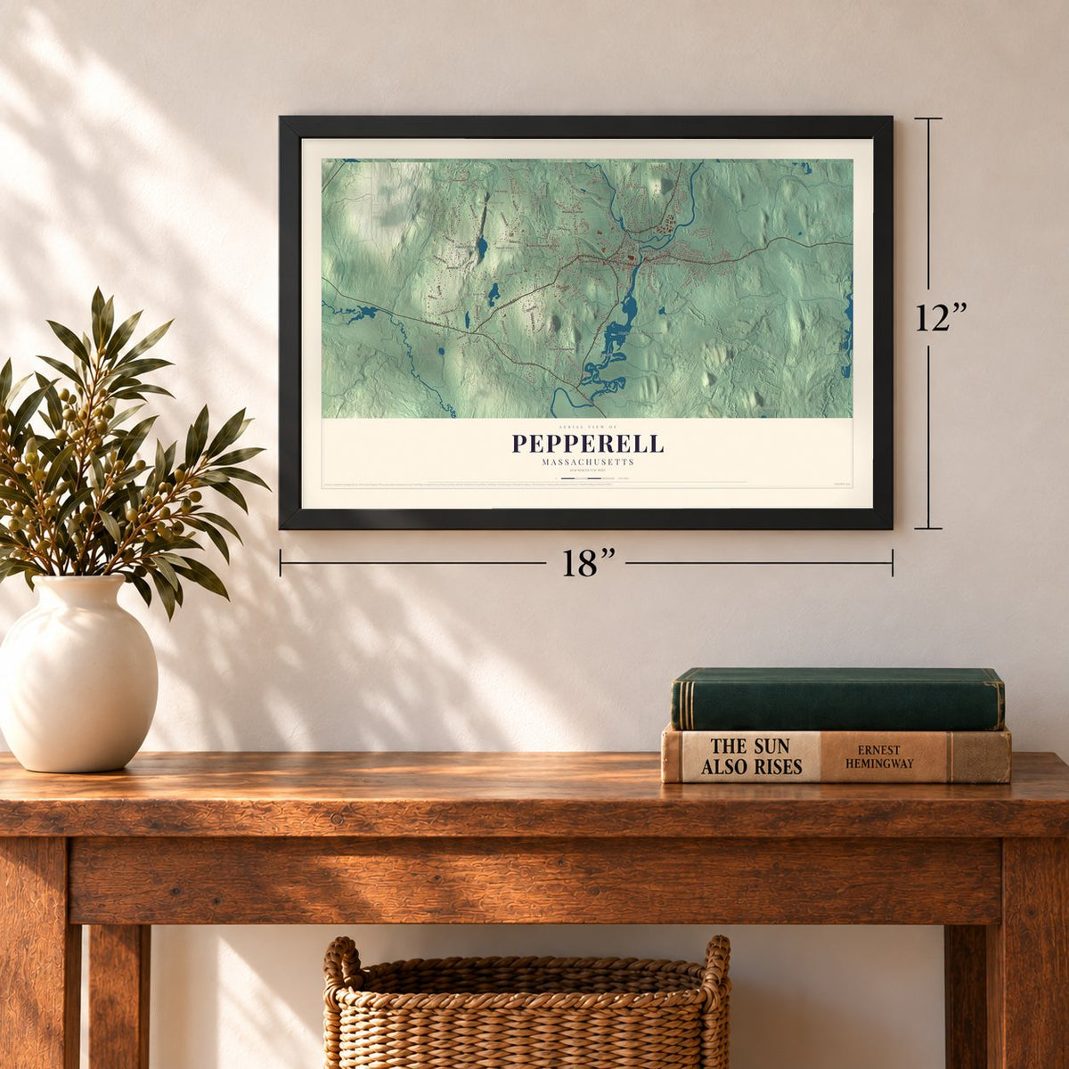 Pepperell, Massachusetts map, 12 x 18 inch print in a black frame in an entryway