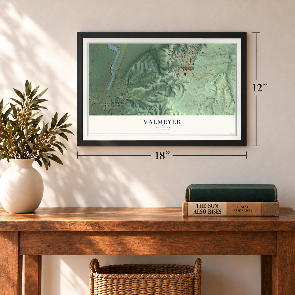 Valmeyer, Illinois map, 12 x 18 inch print in a black frame in an entryway