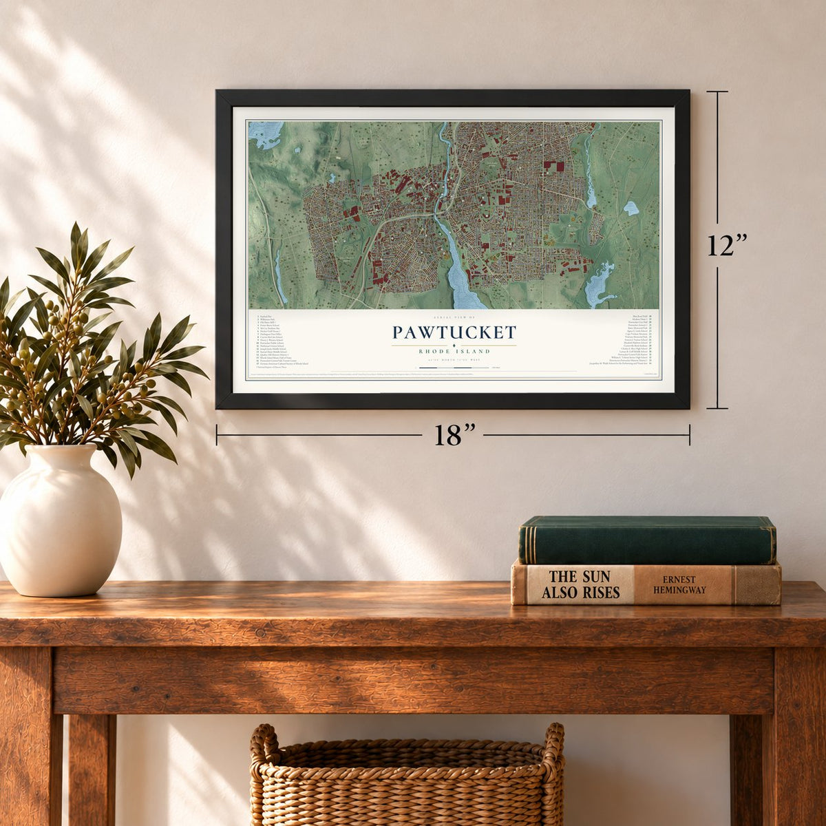 Pawtucket, Rhode Island map, 12 x 18 inch print in a black frame in an entryway