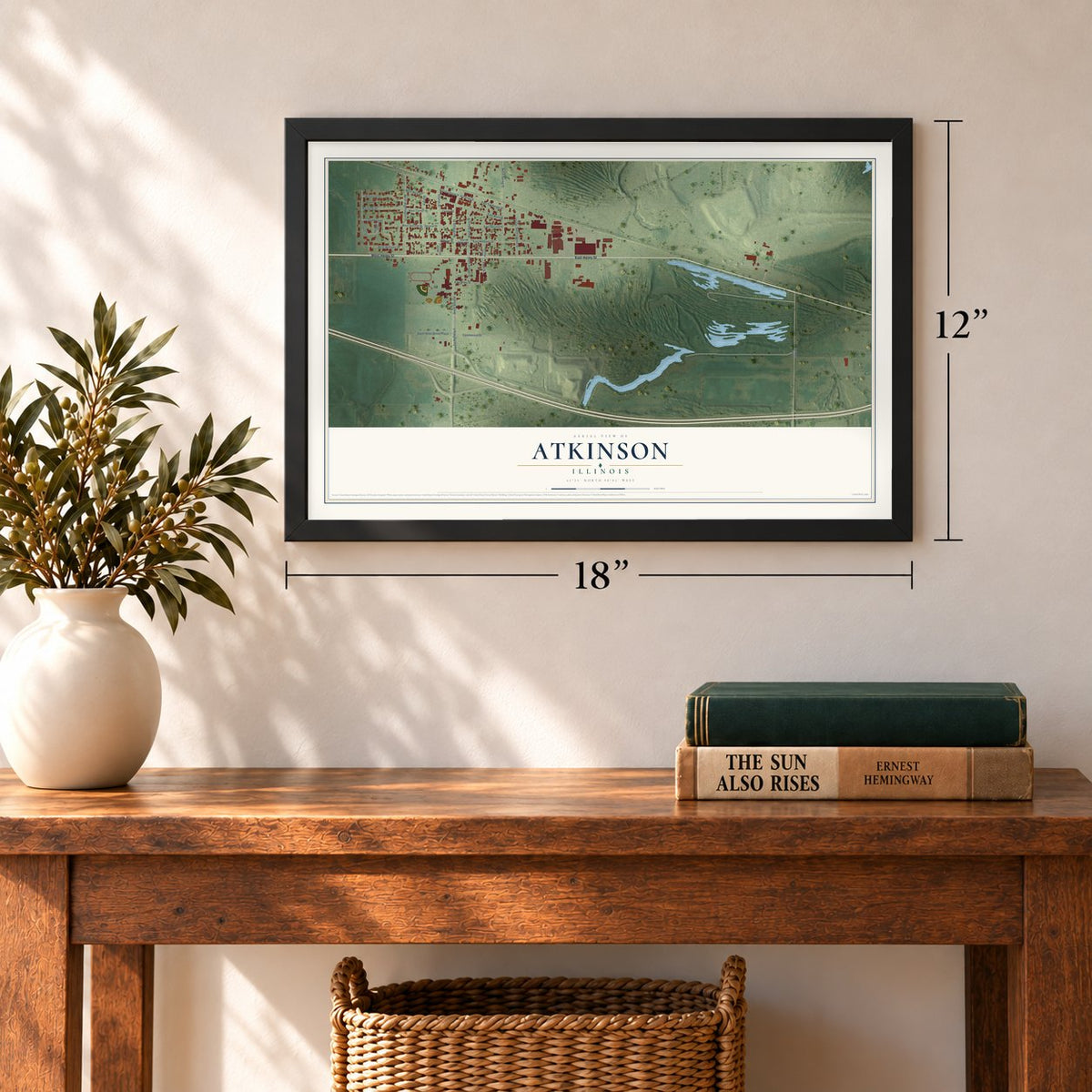 Atkinson, Illinois map, 12 x 18 inch print in a black frame in an entryway