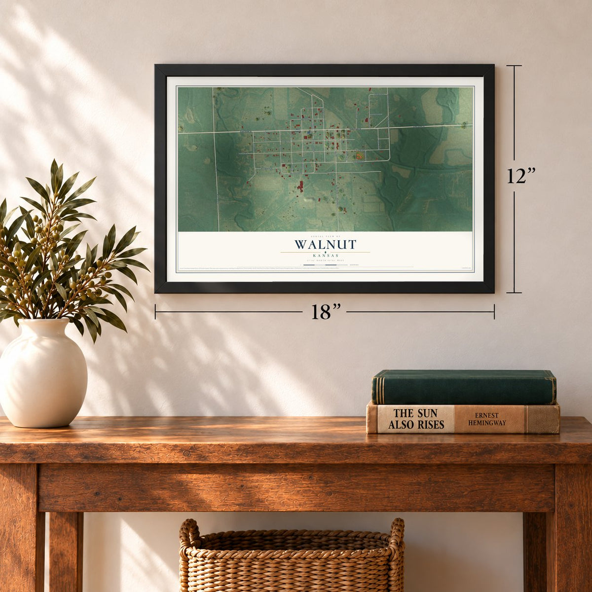 Walnut, Kansas map, 12 x 18 inch print in a black frame in an entryway