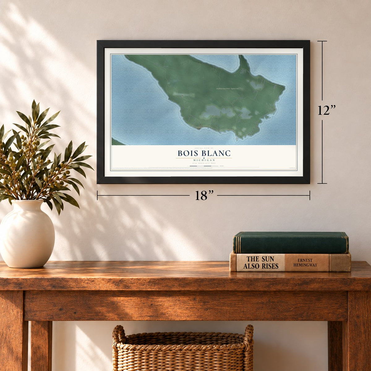 Bois Blanc, Michigan map, 12 x 18 inch print in a black frame in an entryway
