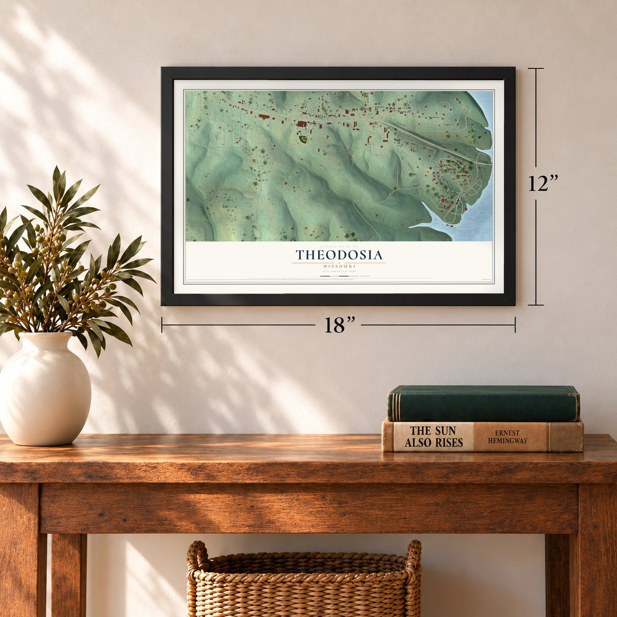 Theodosia, Missouri map, 12 x 18 inch print in a black frame in an entryway