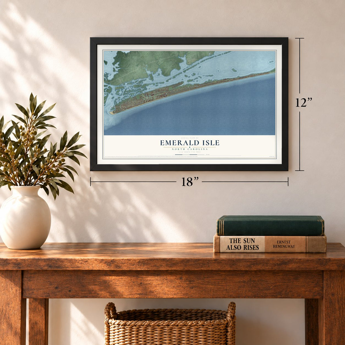 Emerald Isle, North Carolina map, 12 x 18 inch print in a black frame in an entryway