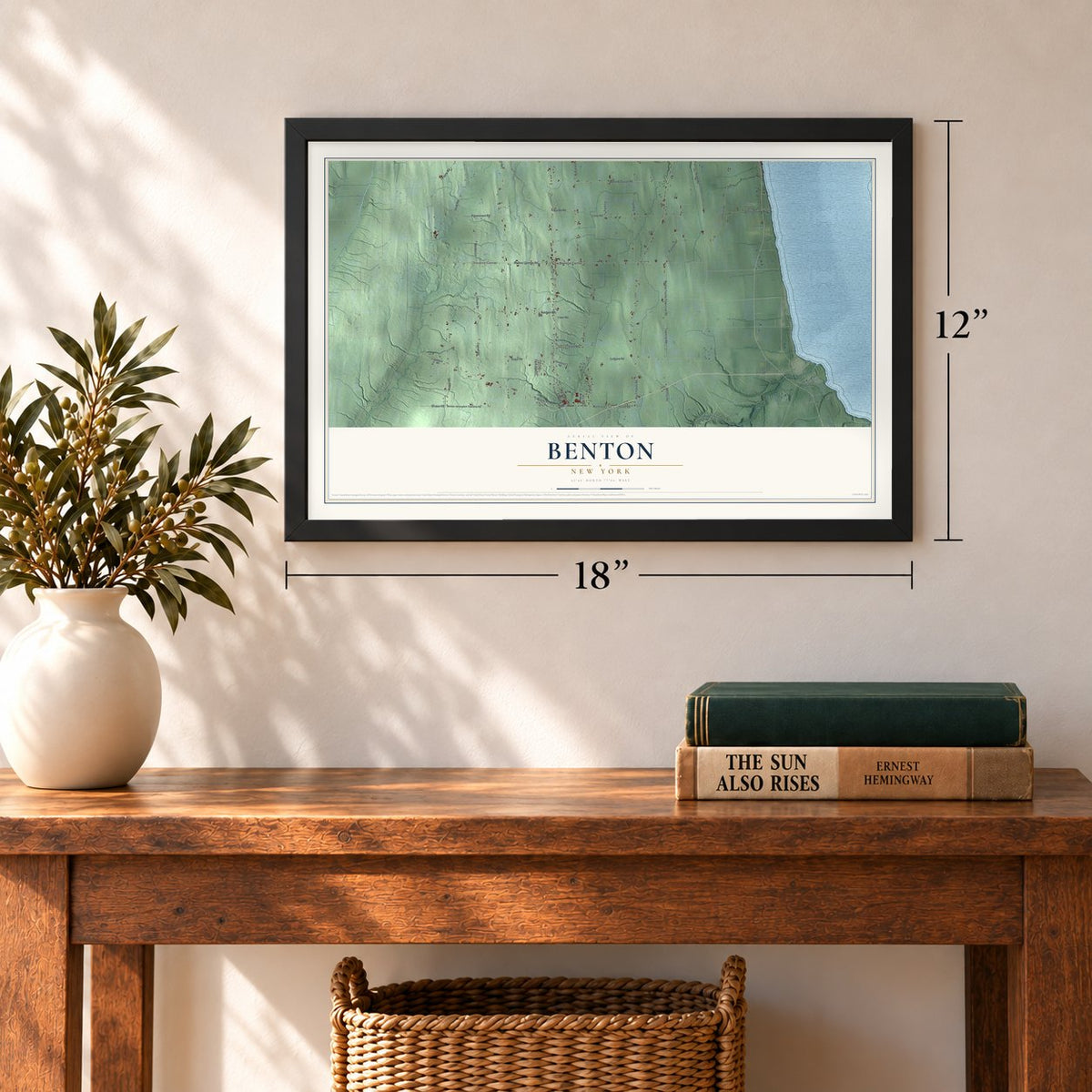 Benton, New York map, 12 x 18 inch print in a black frame in an entryway