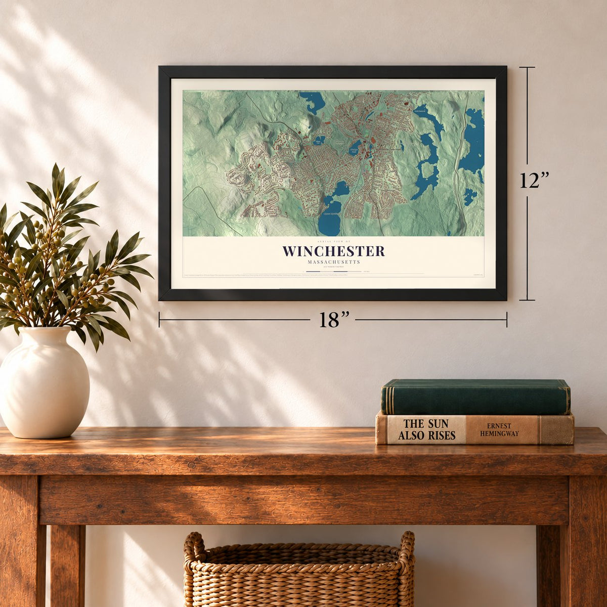 Winchester, Massachusetts map, 12 x 18 inch print in a black frame in an entryway