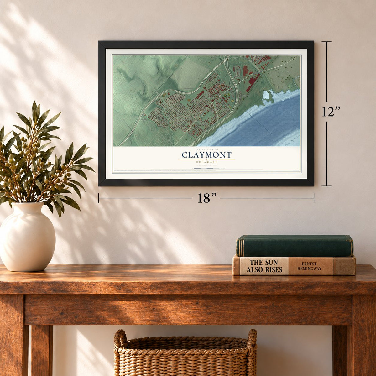 Claymont, Delaware map, 12 x 18 inch print in a black frame in an entryway