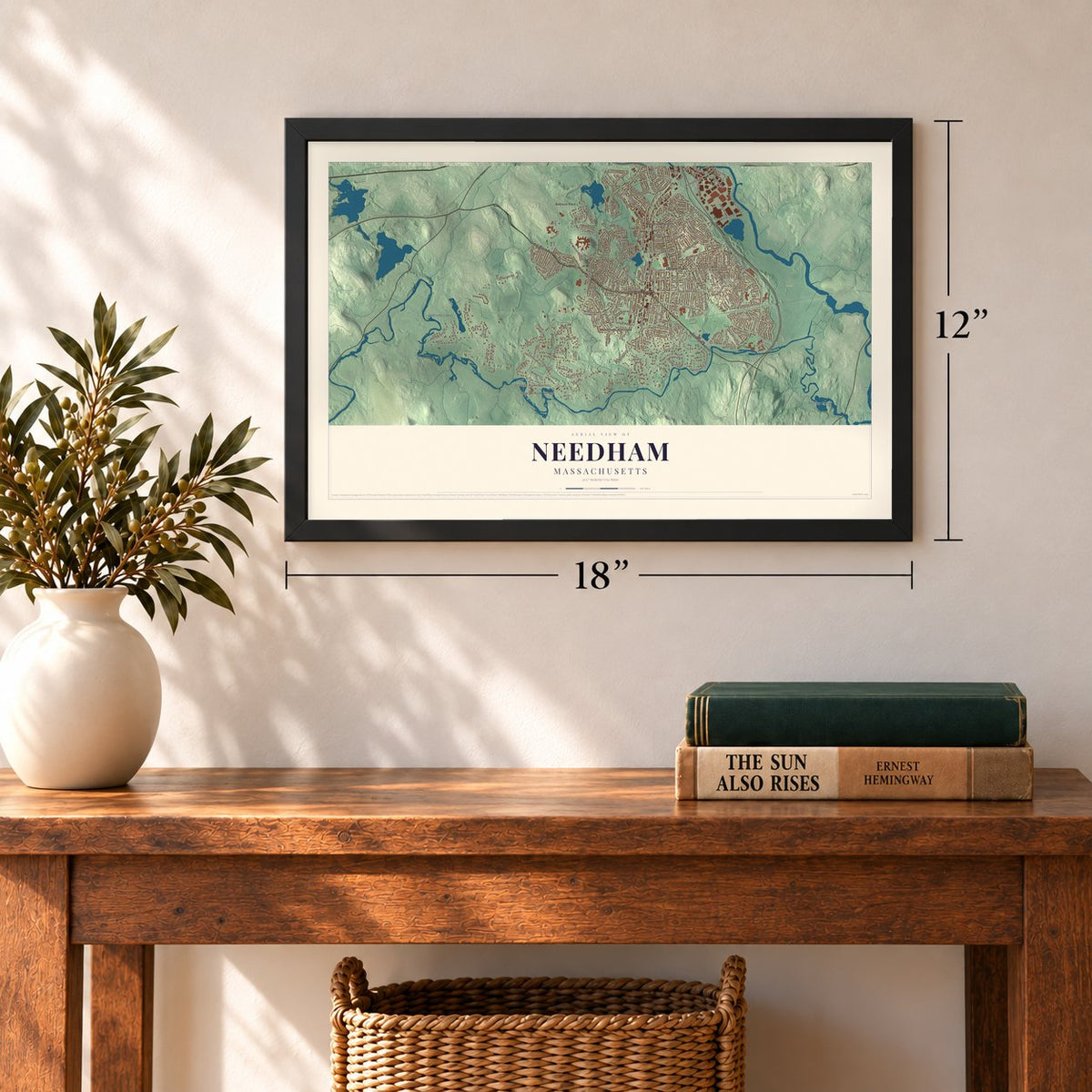 Needham, Massachusetts map, 12 x 18 inch print in a black frame in an entryway