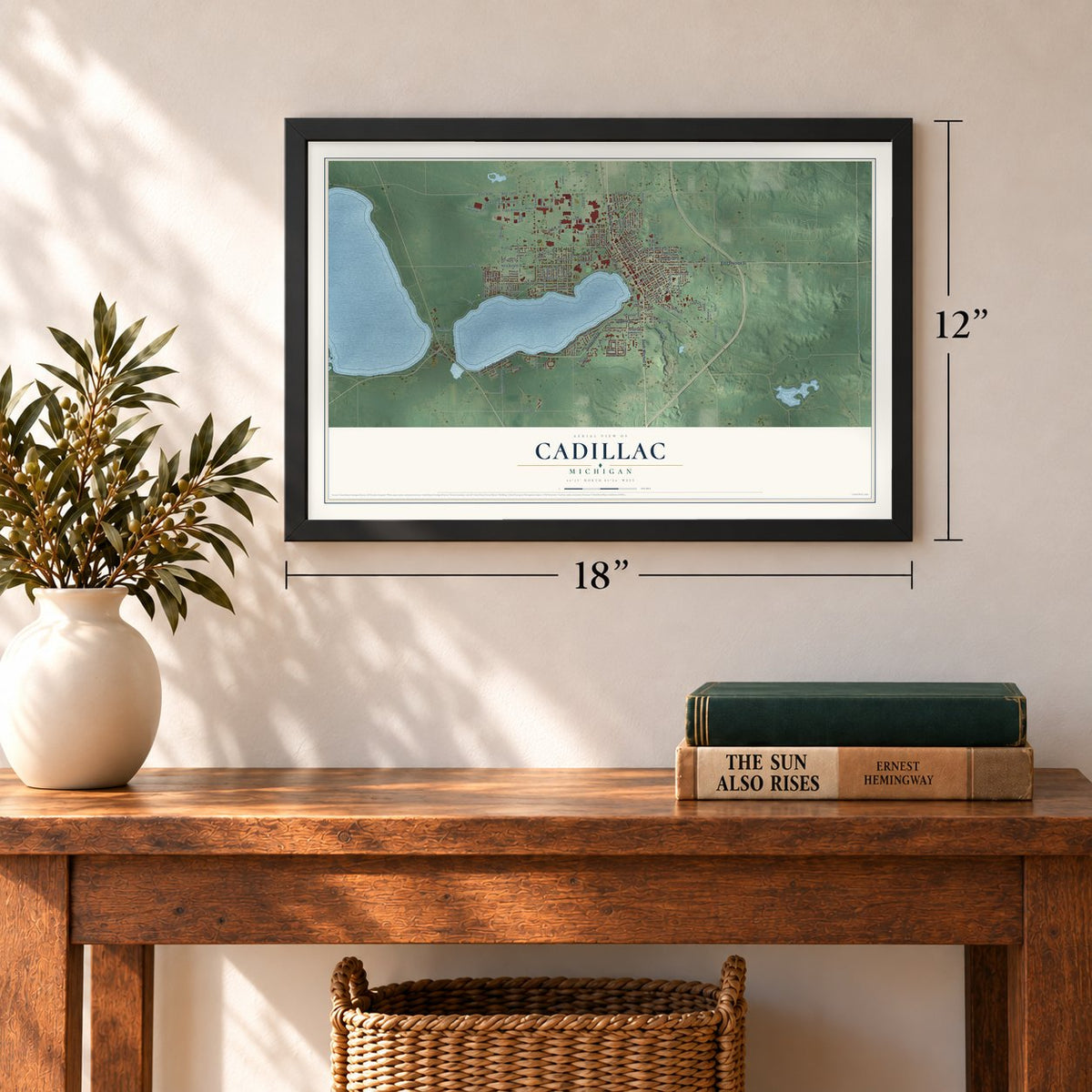 Cadillac, Michigan map, 12 x 18 inch print in a black frame in an entryway