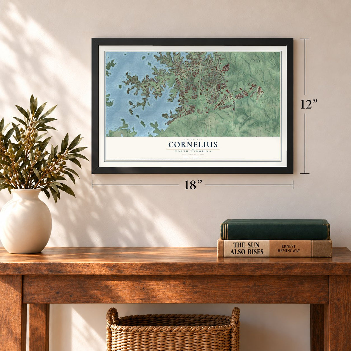 Cornelius, North Carolina map, 12 x 18 inch print in a black frame in an entryway