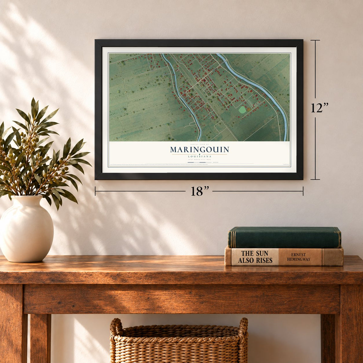 Maringouin, Louisiana map, 12 x 18 inch print in a black frame in an entryway