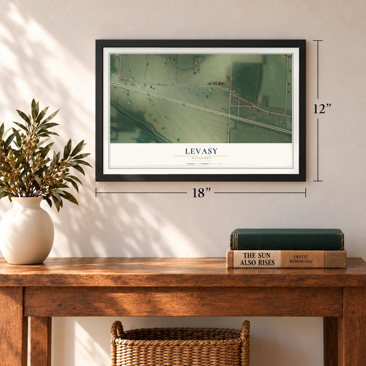 Levasy, Missouri map, 12 x 18 inch print in a black frame in an entryway