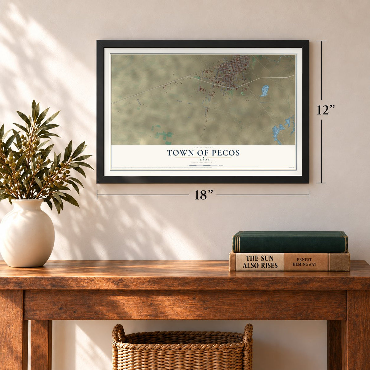 Town of Pecos, Texas map, 12 x 18 inch print in a black frame in an entryway