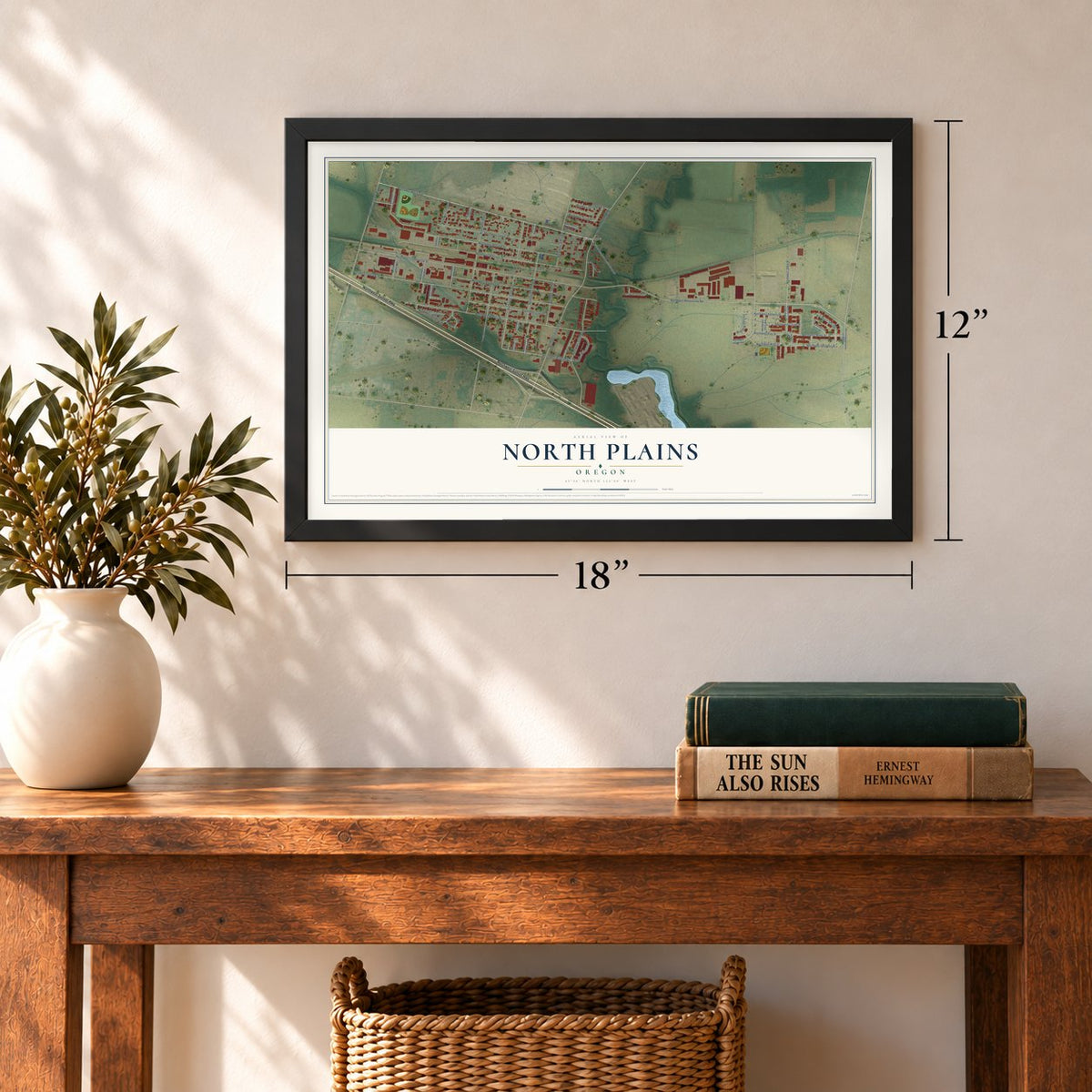 North Plains, Oregon map, 12 x 18 inch print in a black frame in an entryway
