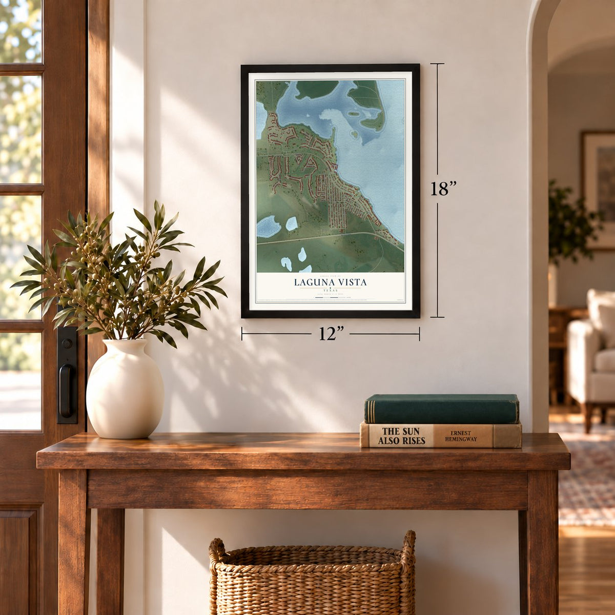 Laguna Vista, Texas map, 12 x 18 inch print in a black frame in an entryway
