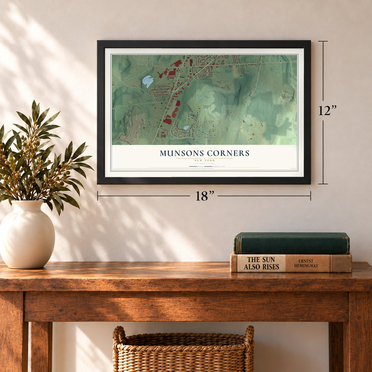 Munsons Corners, New York map, 12 x 18 inch print in a black frame in an entryway