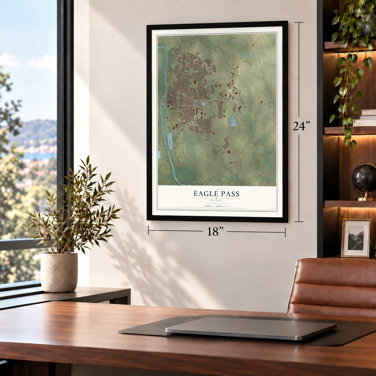 Eagle Pass, Texas map, 18 x 24 inch print in a black frame in a home office