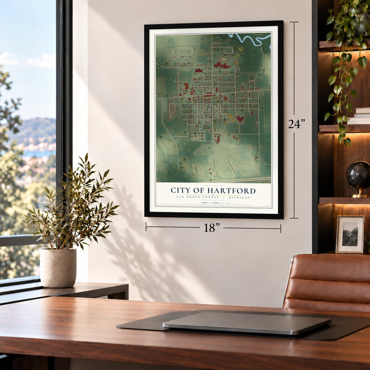 Hartford, Michigan map, 18 x 24 inch print in a black frame in a home office