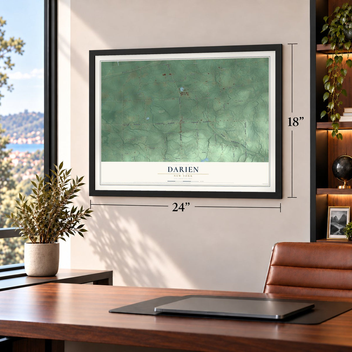 Darien, New York map, 18 x 24 inch print in a black frame in a home office
