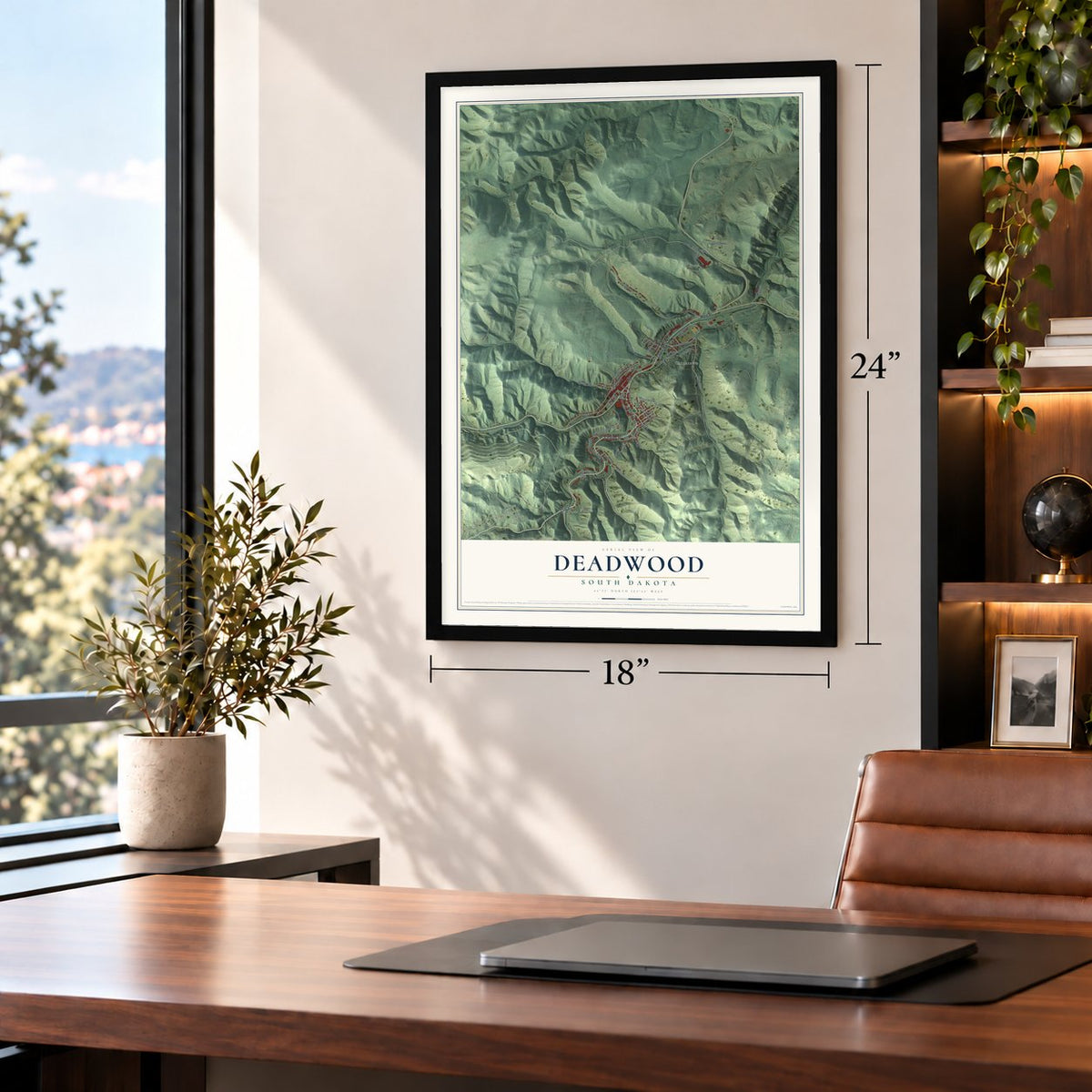 Deadwood, South Dakota map, 18 x 24 inch print in a black frame in a home office