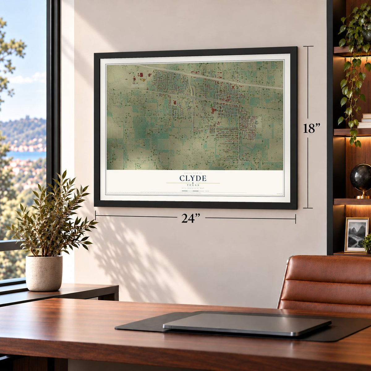 Clyde, Texas map, 18 x 24 inch print in a black frame in a home office