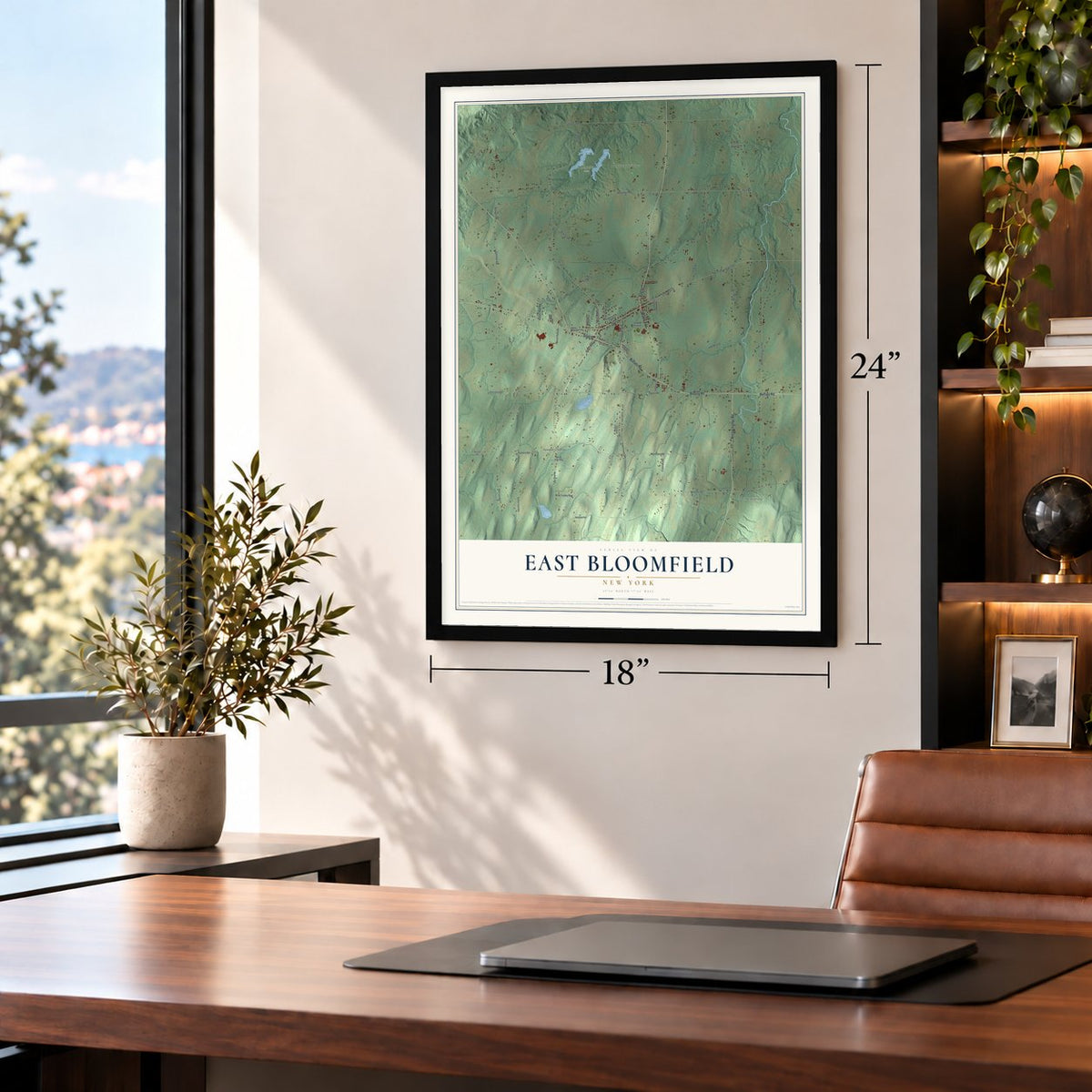 East Bloomfield, New York map, 18 x 24 inch print in a black frame in a home office