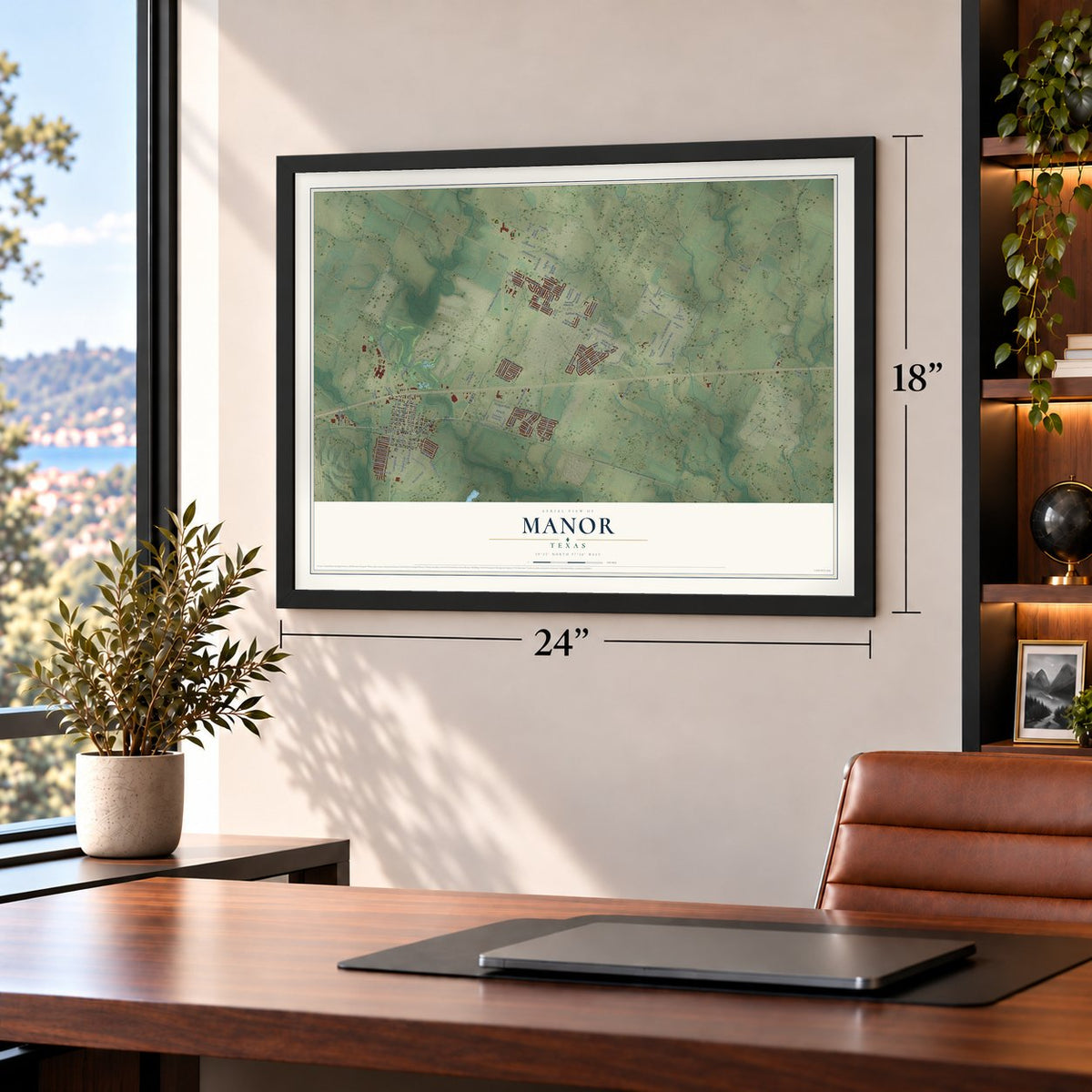 Manor, Texas map, 18 x 24 inch print in a black frame in a home office