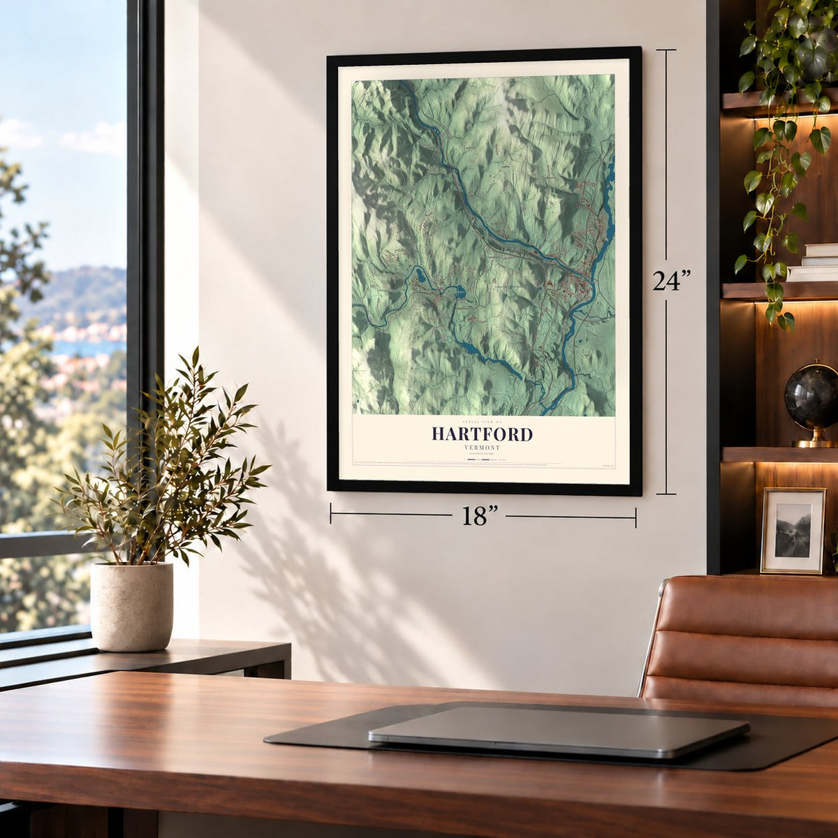 Hartford, Vermont map, 18 x 24 inch print in a black frame in a home office