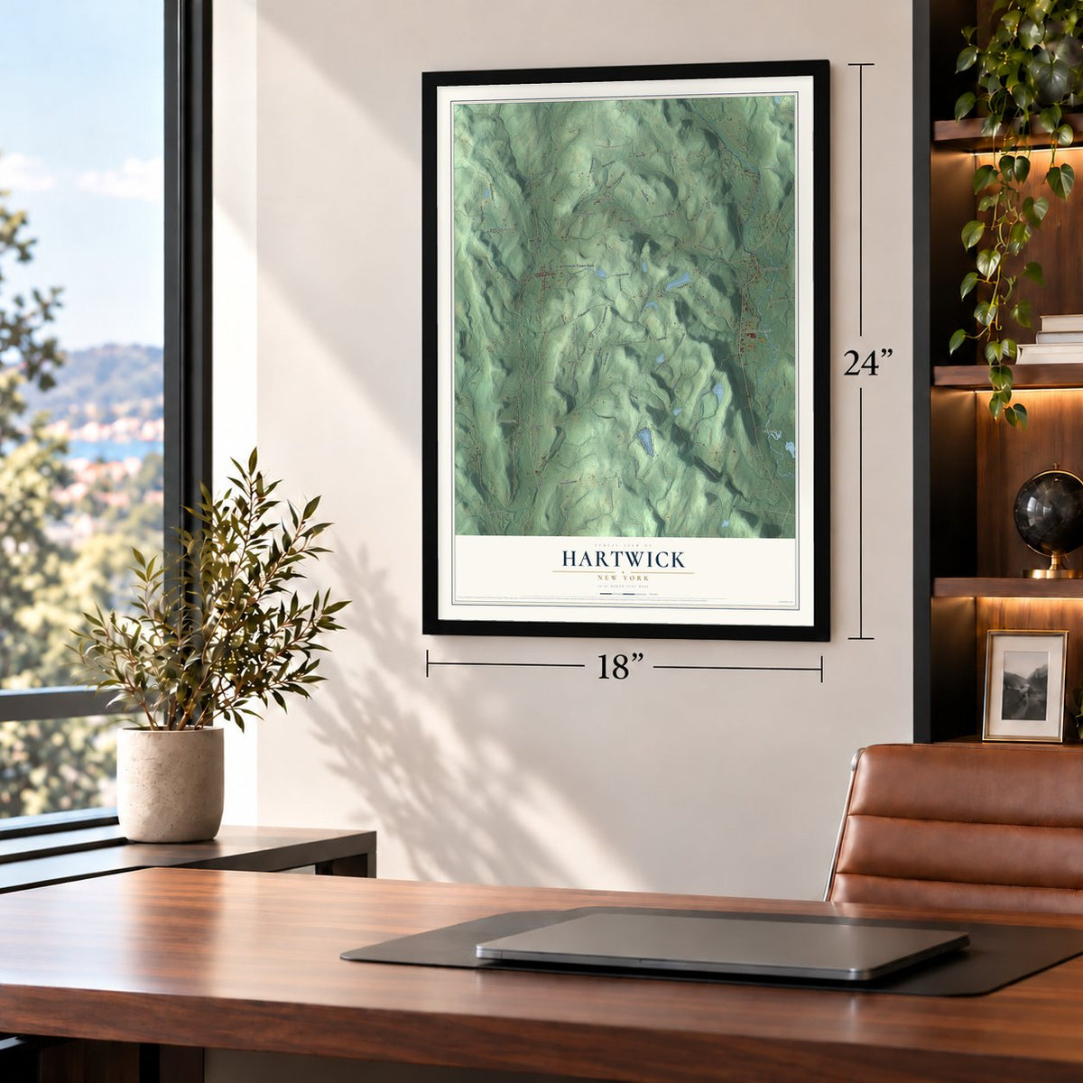 Hartwick, New York map, 18 x 24 inch print in a black frame in a home office