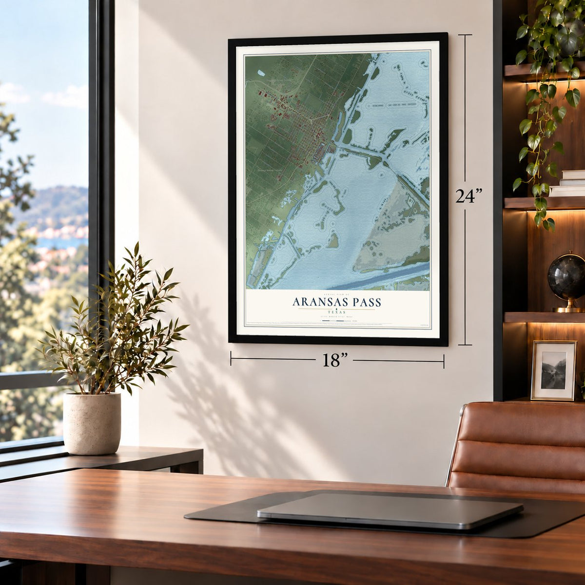 Aransas Pass, Texas map, 18 x 24 inch print in a black frame in a home office