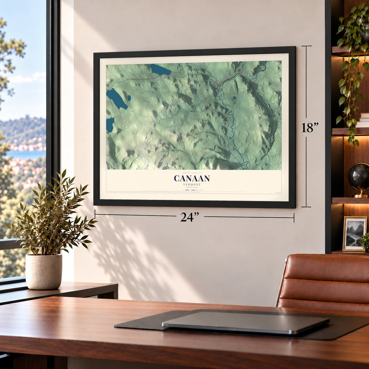 Canaan, Vermont map, 18 x 24 inch print in a black frame in a home office