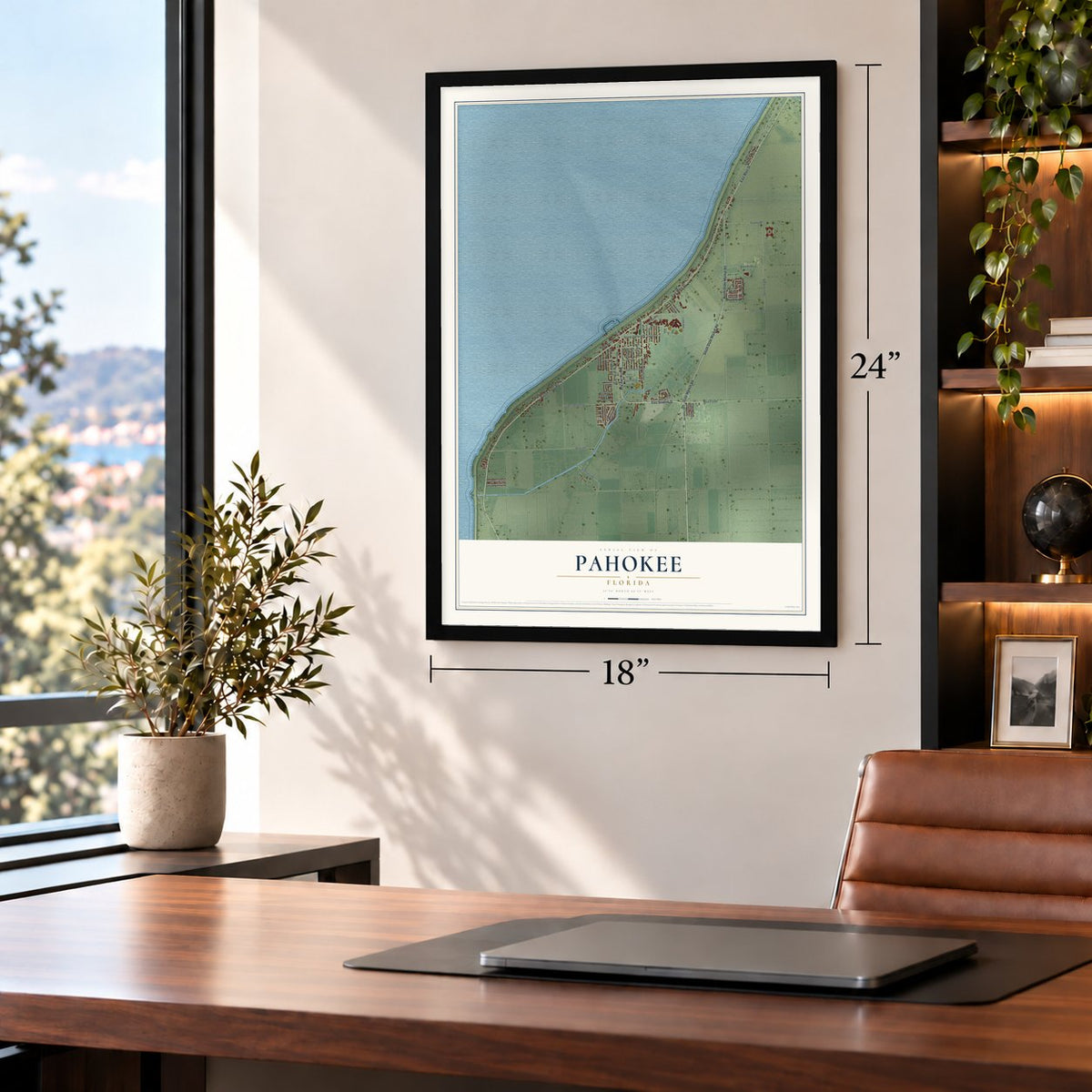 Pahokee, Florida map, 18 x 24 inch print in a black frame in a home office