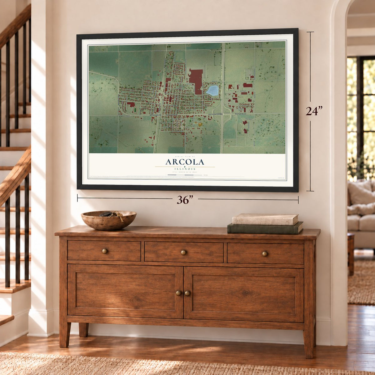 Arcola, Illinois map, 24 x 36 inch print in a black frame above a dresser by a staircase