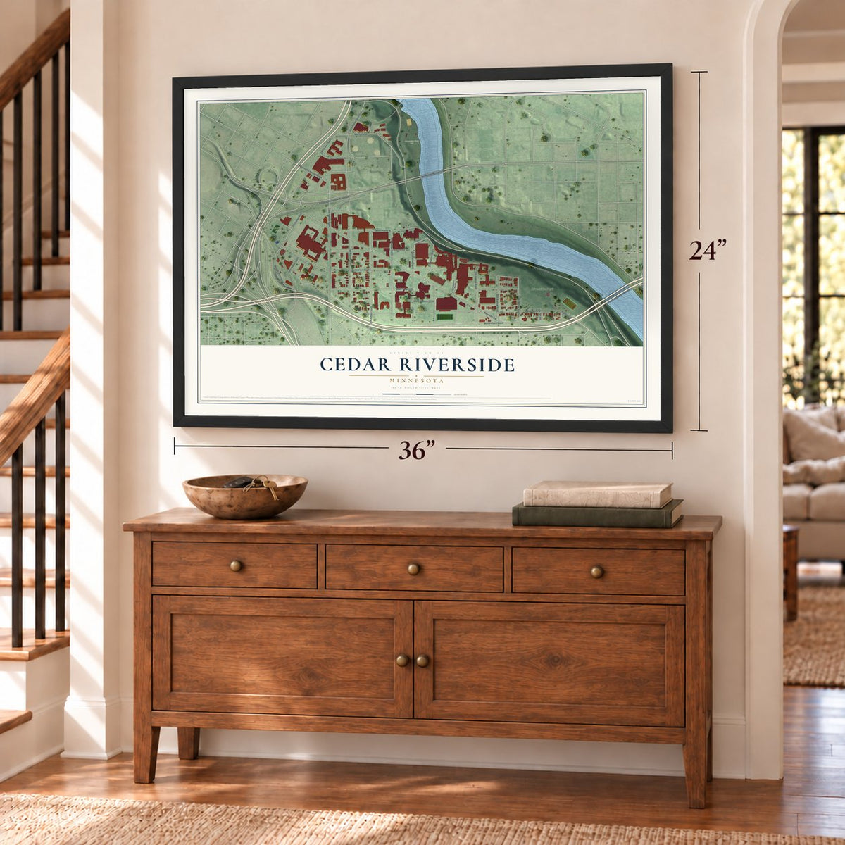 Cedar Riverside, Minnesota map, 24 x 36 inch print in a black frame above a dresser by a staircase