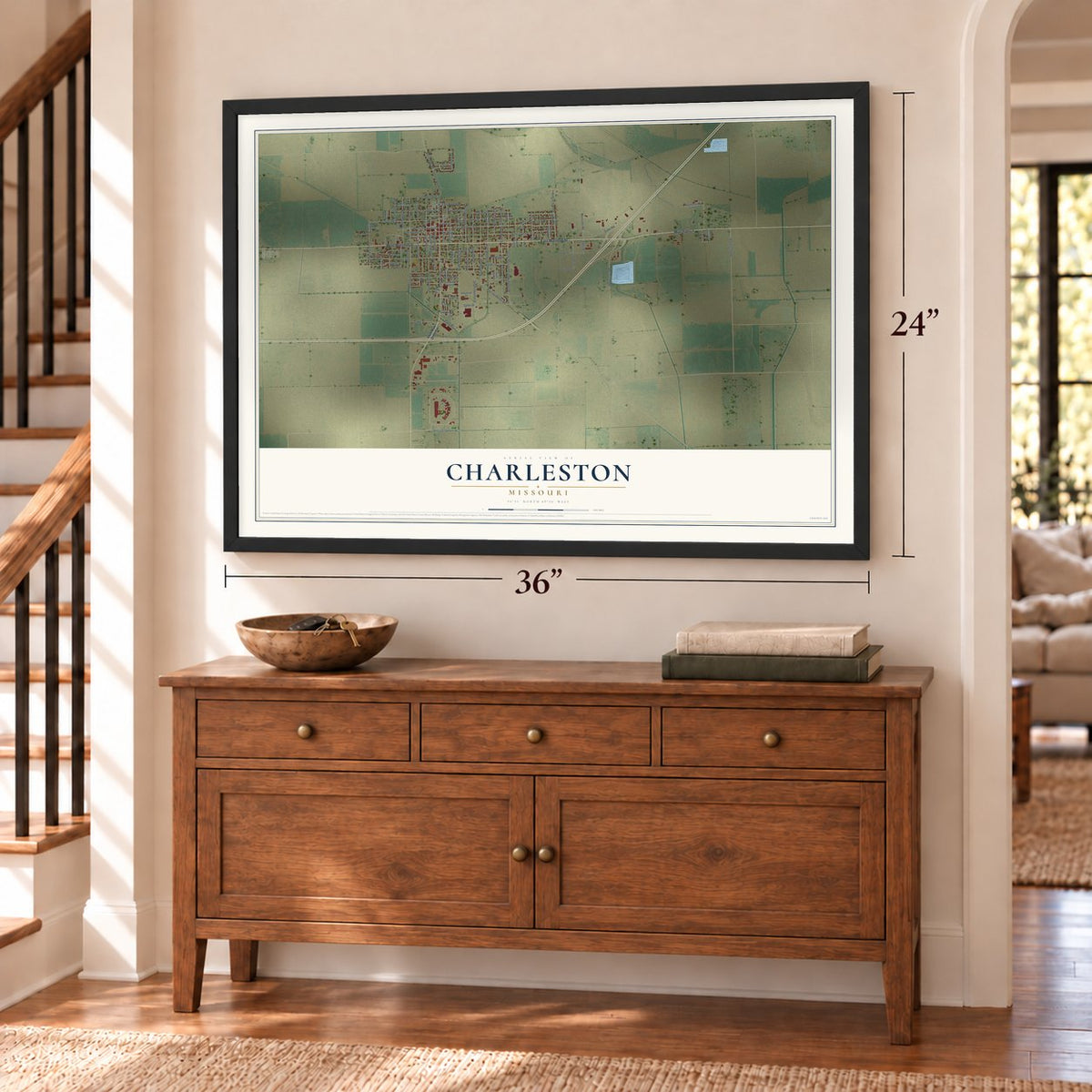 Charleston, Missouri map, 24 x 36 inch print in a black frame above a dresser by a staircase