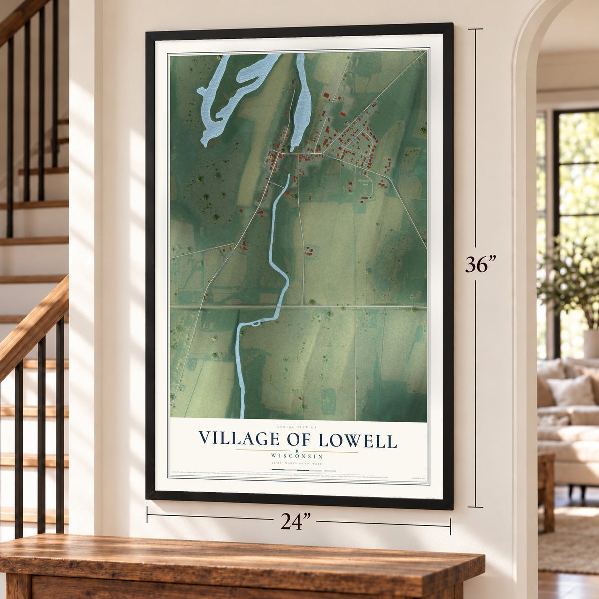Lowell, Wisconsin map, 24 x 36 inch print in a black frame by a staircase