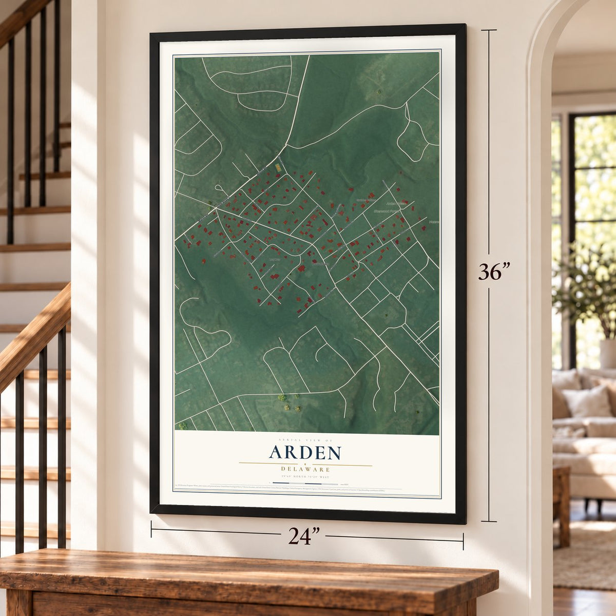 Arden, Delaware map, 24 x 36 inch print in a black frame by a staircase