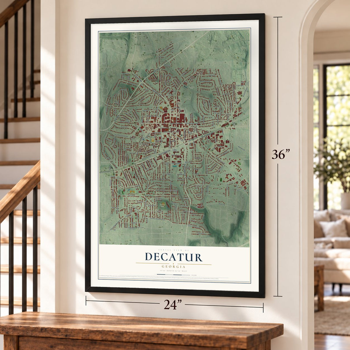 Decatur, Georgia map, 24 x 36 inch print in a black frame by a staircase