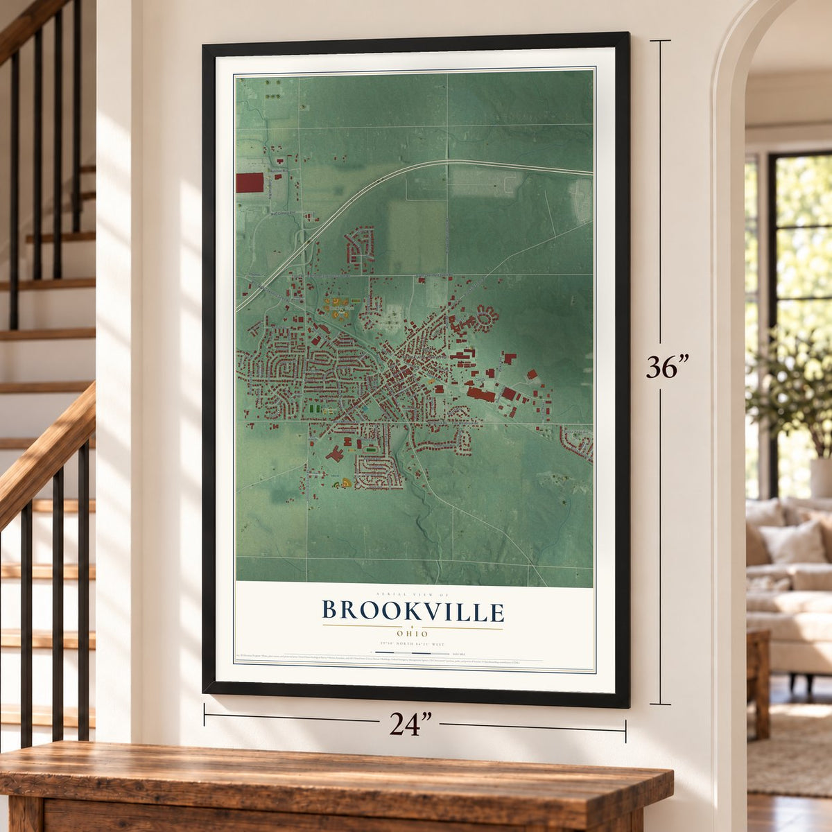 Brookville, Ohio map, 24 x 36 inch print in a black frame by a staircase