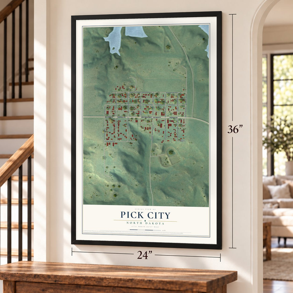 Pick City, North Dakota map, 24 x 36 inch print in a black frame by a staircase