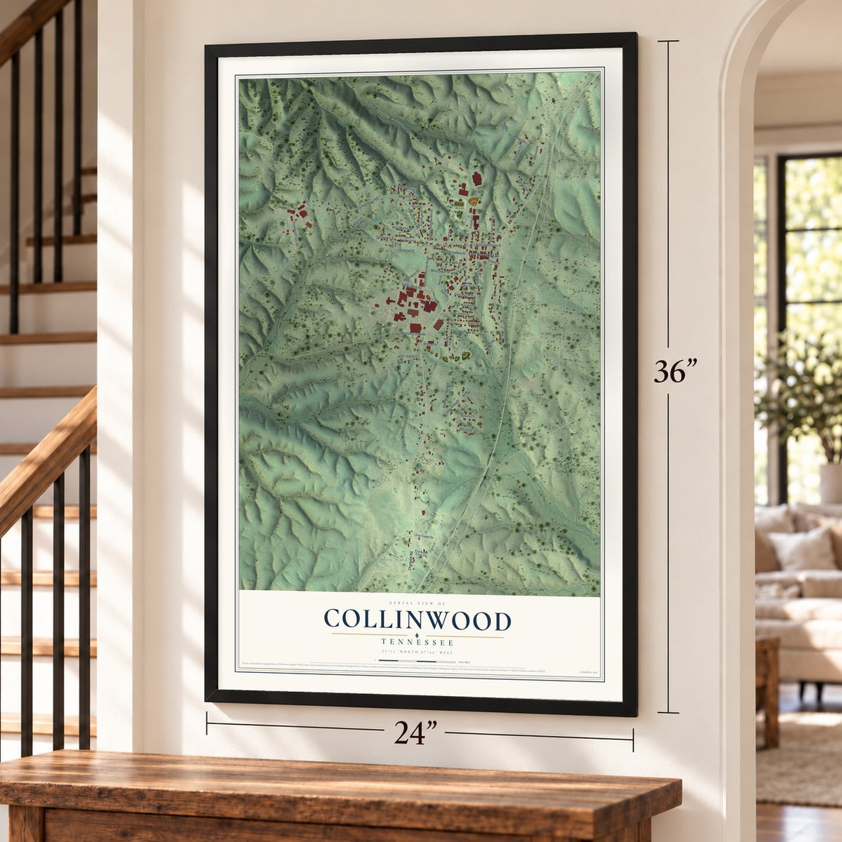 Collinwood, Tennessee map, 24 x 36 inch print in a black frame by a staircase