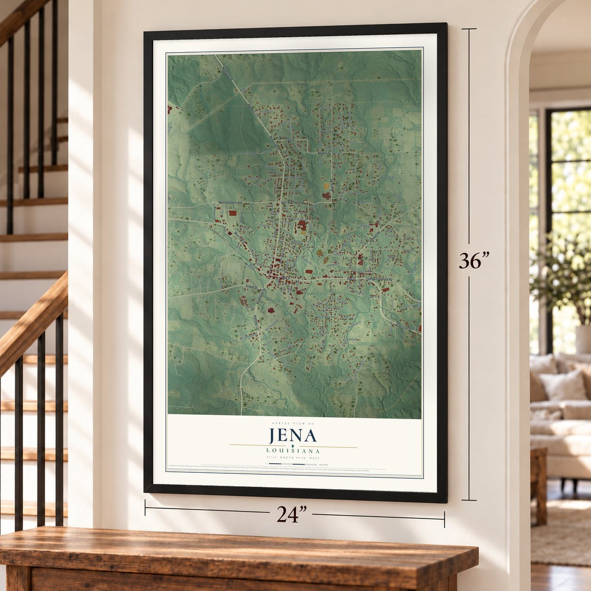 Jena, Louisiana map, 24 x 36 inch print in a black frame by a staircase