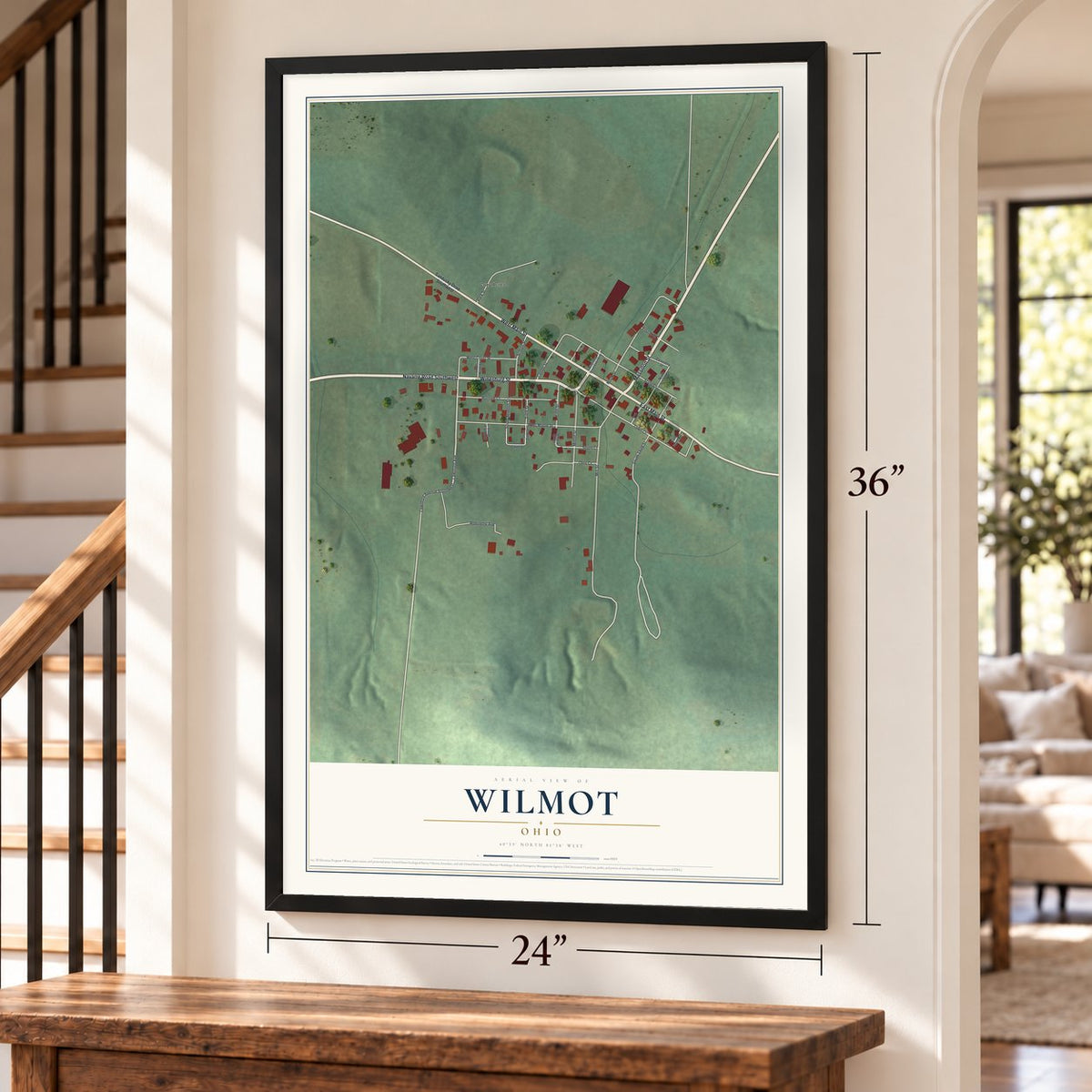 Wilmot, Ohio map, 24 x 36 inch print in a black frame by a staircase