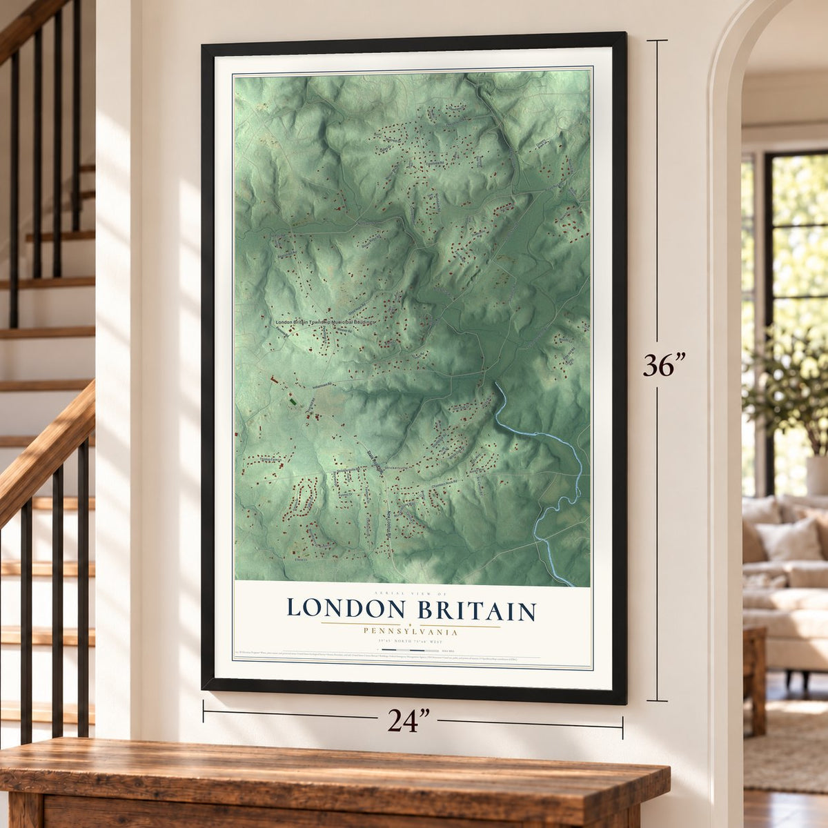 London Britain, Pennsylvania map, 24 x 36 inch print in a black frame by a staircase