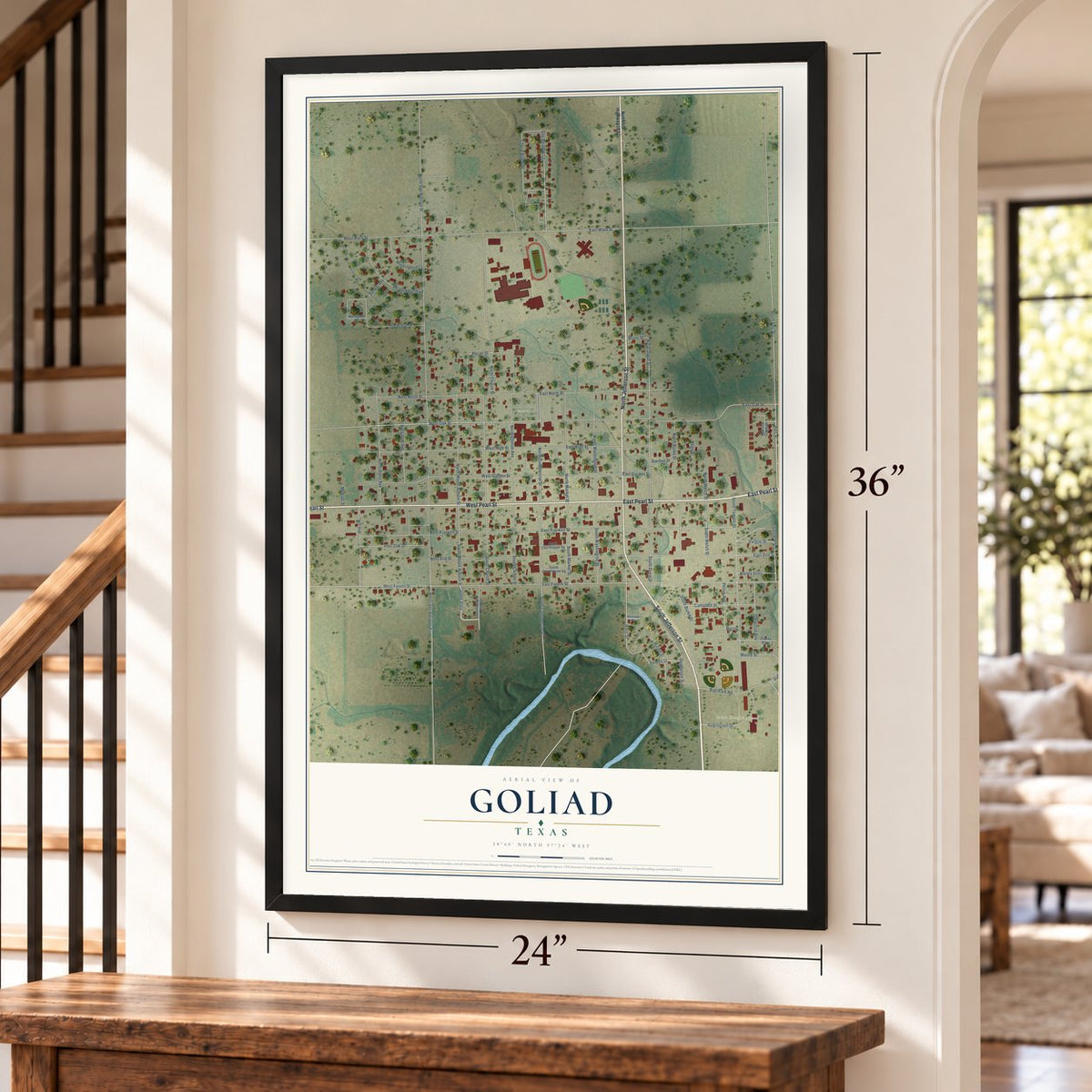 Goliad, Texas map, 24 x 36 inch print in a black frame by a staircase