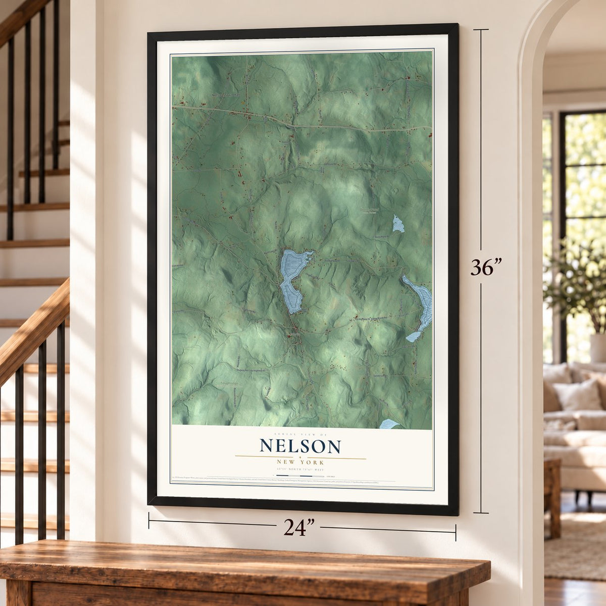 Nelson, New York map, 24 x 36 inch print in a black frame by a staircase