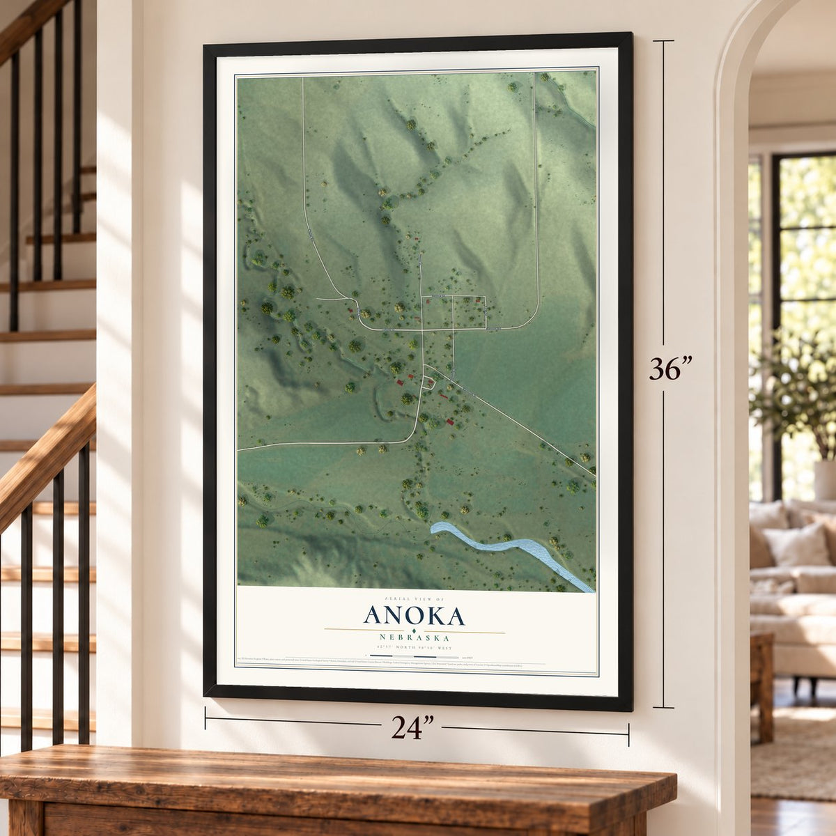 Anoka, Nebraska map, 24 x 36 inch print in a black frame by a staircase